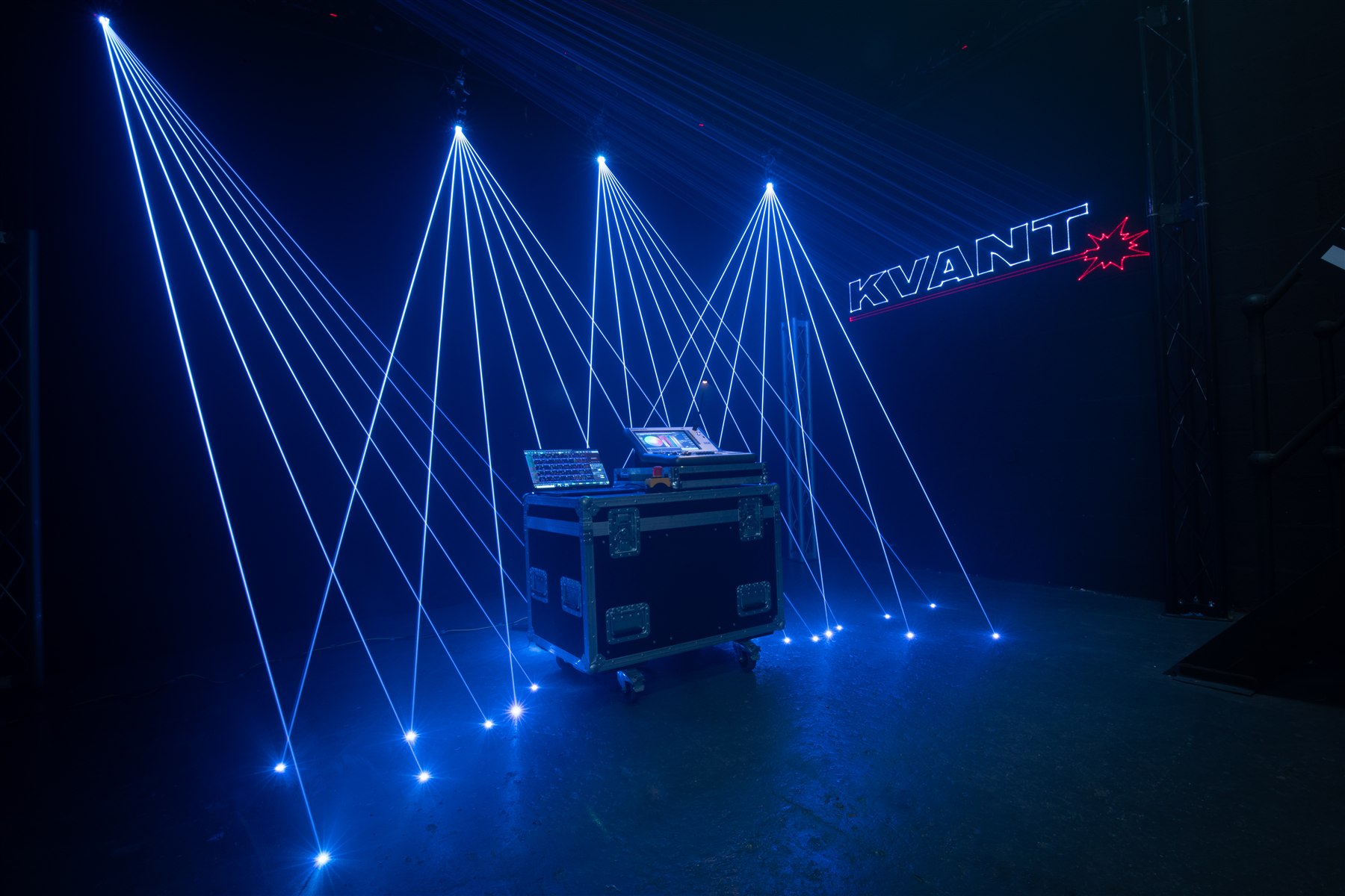 Blue Kvant laser beams across an indoor demonstration space